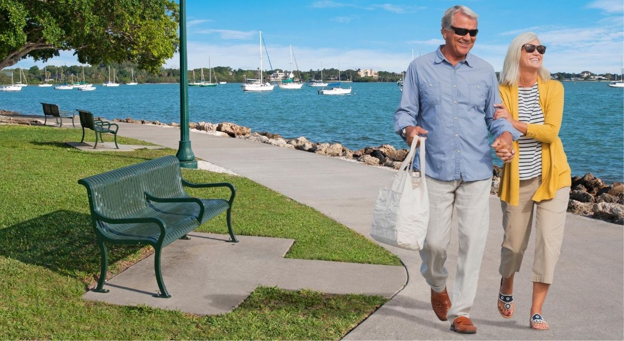 couple walking in downtown sarasota bayfront