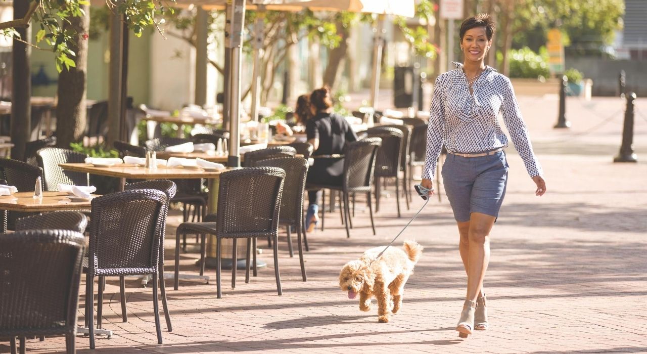 Woman dog walking at Sarasota